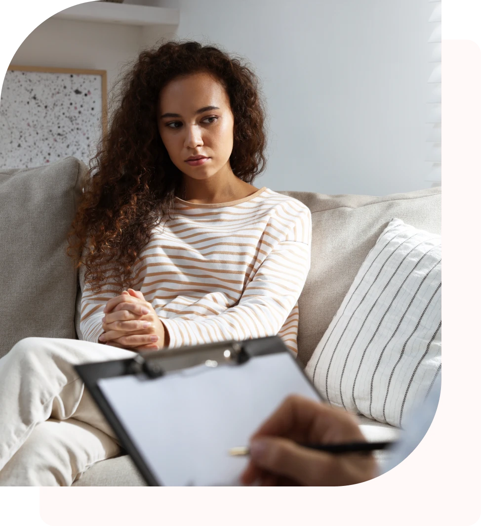 Woman in therapy session on couch